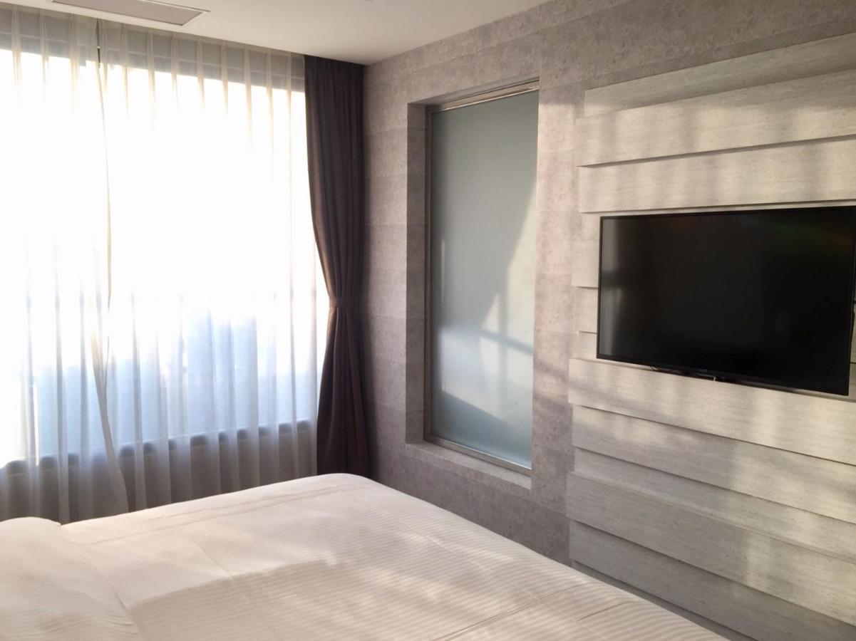 Fengjia Hotel Bell Taichung Bagian luar foto