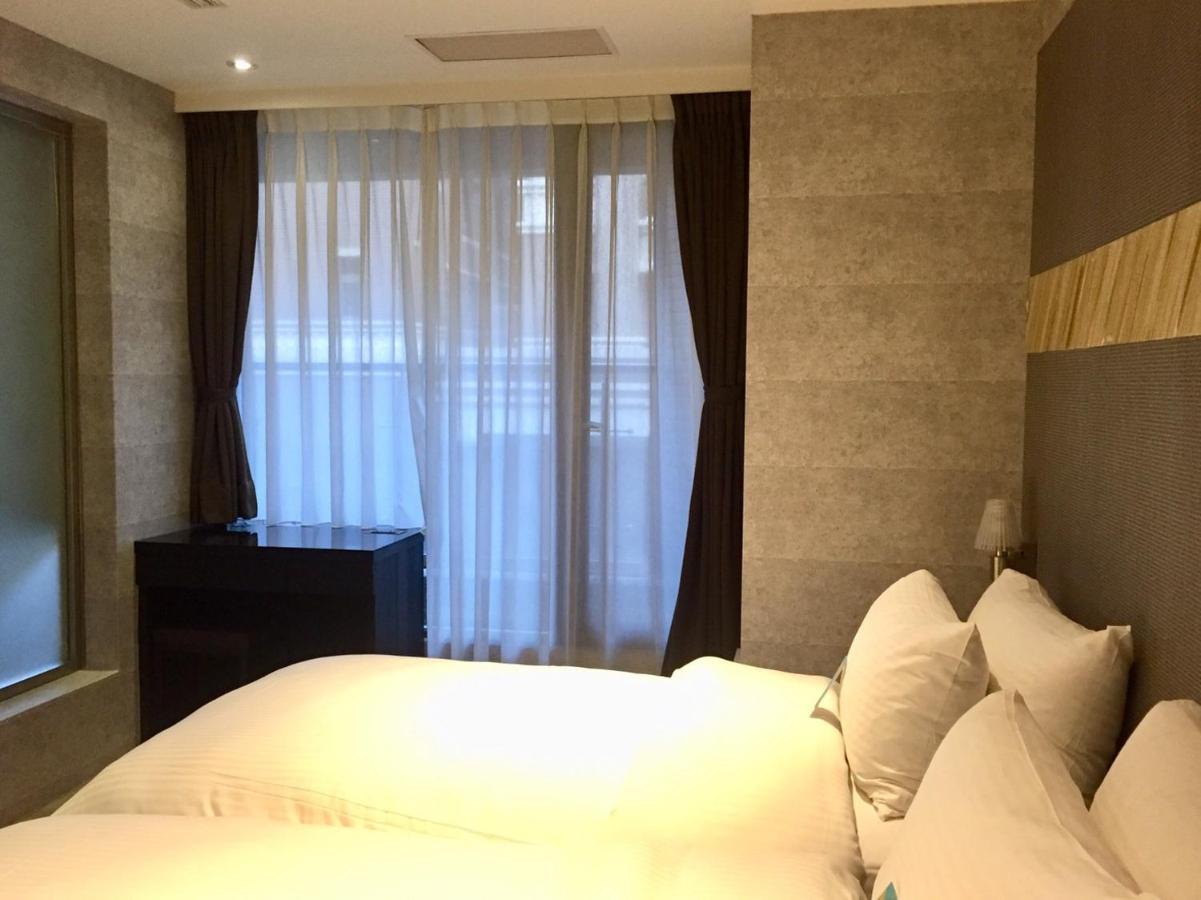 Fengjia Hotel Bell Taichung Bagian luar foto